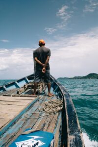 sea, beach, ship, fisherman, man, ocean, blue sky, summer, sky, vacation, travel, water, tropical, blue, nature, coast